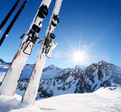 Ski equipment in high mountains in snow at winter